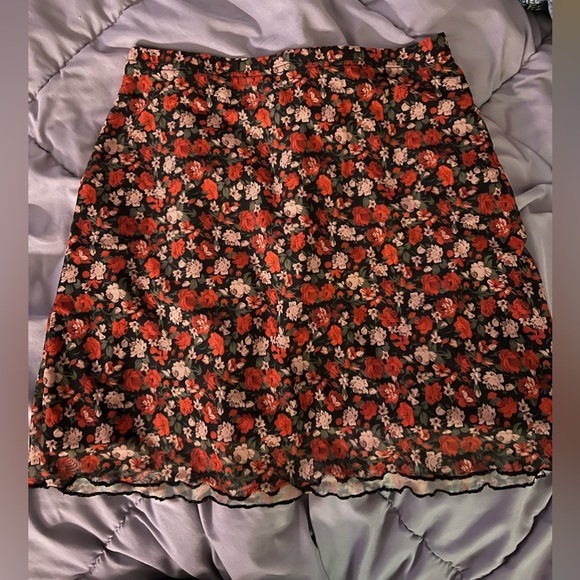 two shein skirts one plain black and other has flowers :) both xs - Picture 2 of 6
